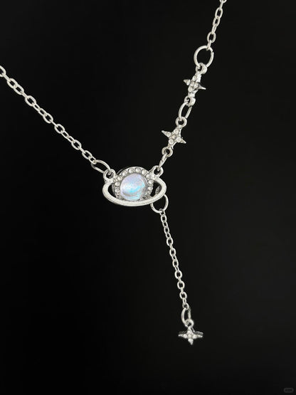 Discover the Astro Dust Necklace, inspired by the beauty of nebulae and the light of humanity. A celestial accessory that symbolizes connection and love. Limited to 13 pieces. Shop now at Y2Bling.