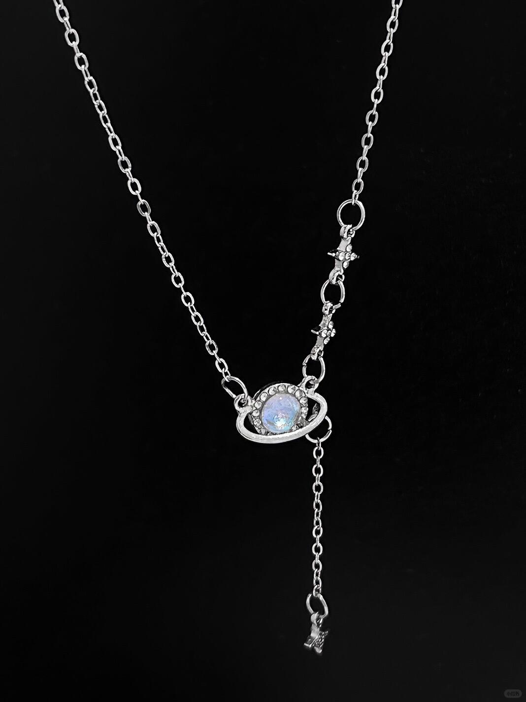 Discover the Astro Dust Necklace, inspired by the beauty of nebulae and the light of humanity. A celestial accessory that symbolizes connection and love. Limited to 13 pieces. Shop now at Y2Bling.