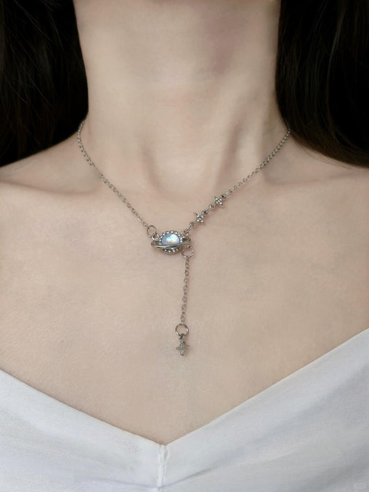 Discover the Astro Dust Necklace, inspired by the beauty of nebulae and the light of humanity. A celestial accessory that symbolizes connection and love. Limited to 13 pieces. Shop now at Y2Bling.