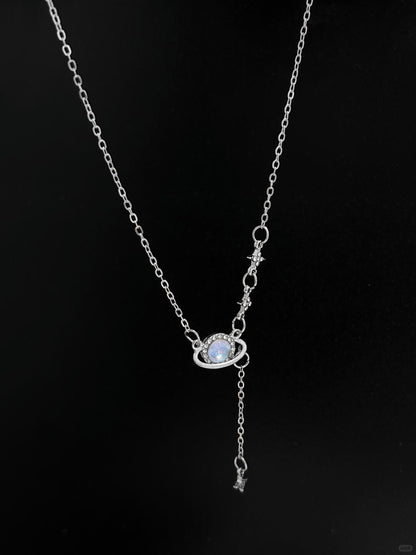 Discover the Astro Dust Necklace, inspired by the beauty of nebulae and the light of humanity. A celestial accessory that symbolizes connection and love. Limited to 13 pieces. Shop now at Y2Bling.