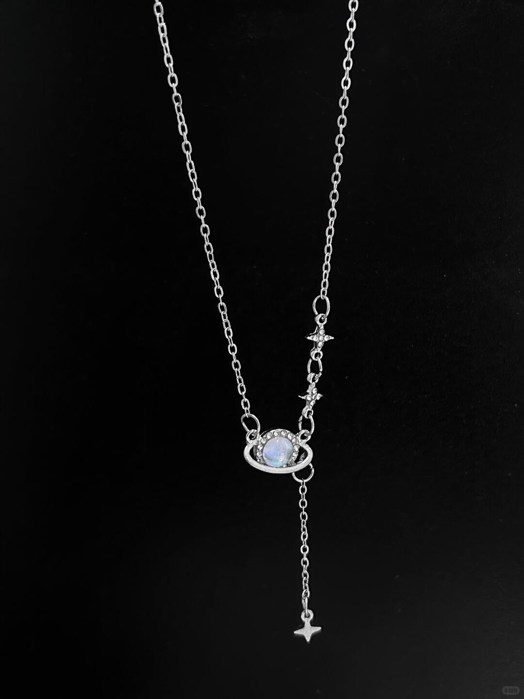Discover the Astro Dust Necklace, inspired by the beauty of nebulae and the light of humanity. A celestial accessory that symbolizes connection and love. Limited to 13 pieces. Shop now at Y2Bling.