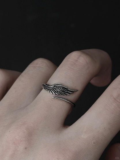Lone Feather Chronicle | Asymmetric Feather Wing Statement Ring (Y2K Limited)